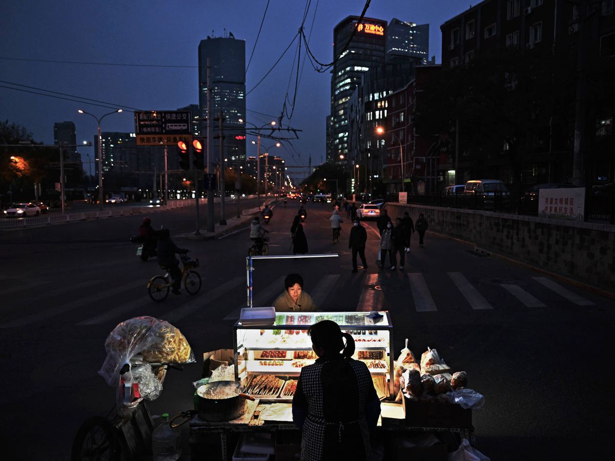 Foto: Un puesto de comida en Pekín. (Getty/Kevin Frayer)