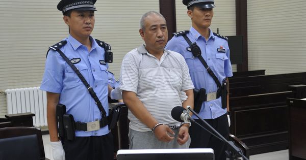 Foto: Gao Chengyong, en el momento de enfrentarse al juicio por sus once asesinatos. (Reuters)