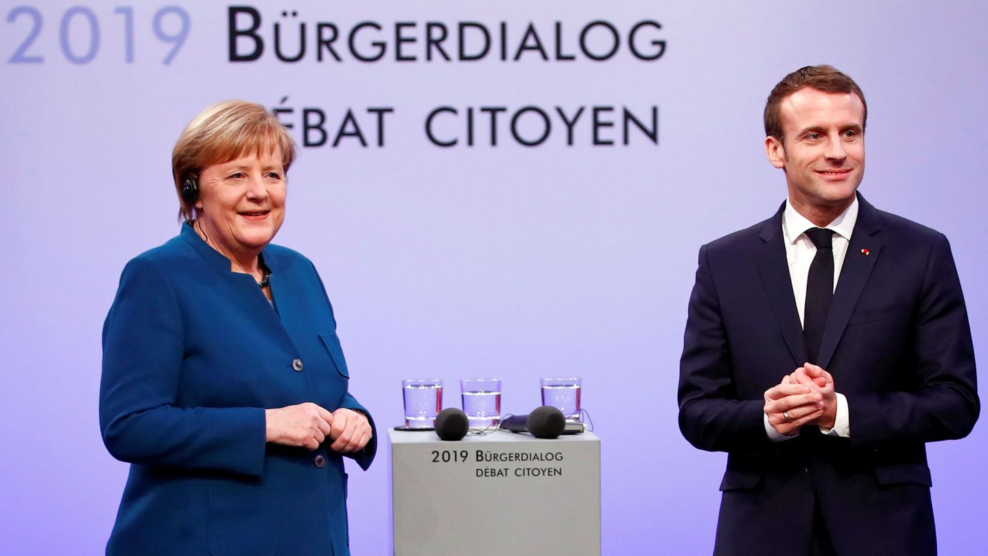 Angela Merkel y Emmenuel Macron durante un debate ciudadano en Aachen (EFE)