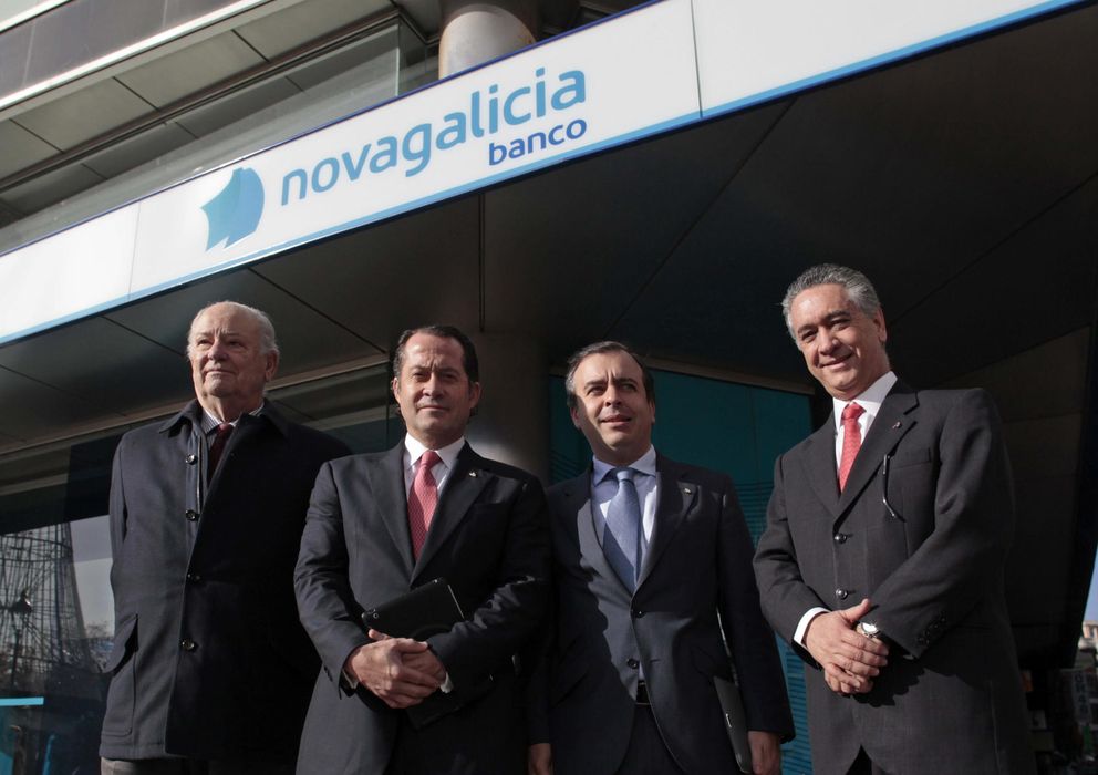 Foto: El presidente de Banesco, segundo por la izquierda, visita las oficinas de Novagalicia Banco. (Efe)
