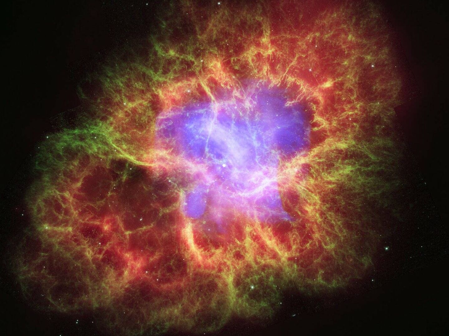 La nebulosa del Cangrejo con su estrella de neutrones giratoria. (NASA - ESA)