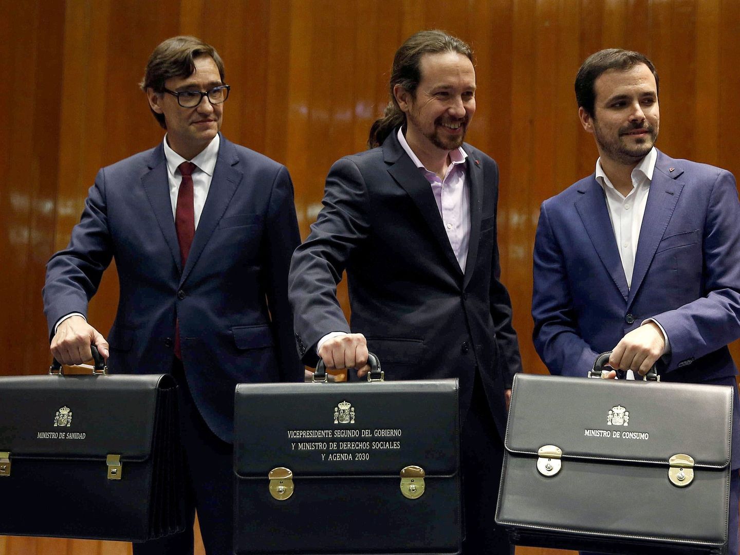 Salvador Illa, Pablo Iglesias y Alberto Garzón, durante el acto de recepción de las carteras ministeriales el pasado mes de enero. (EFE)