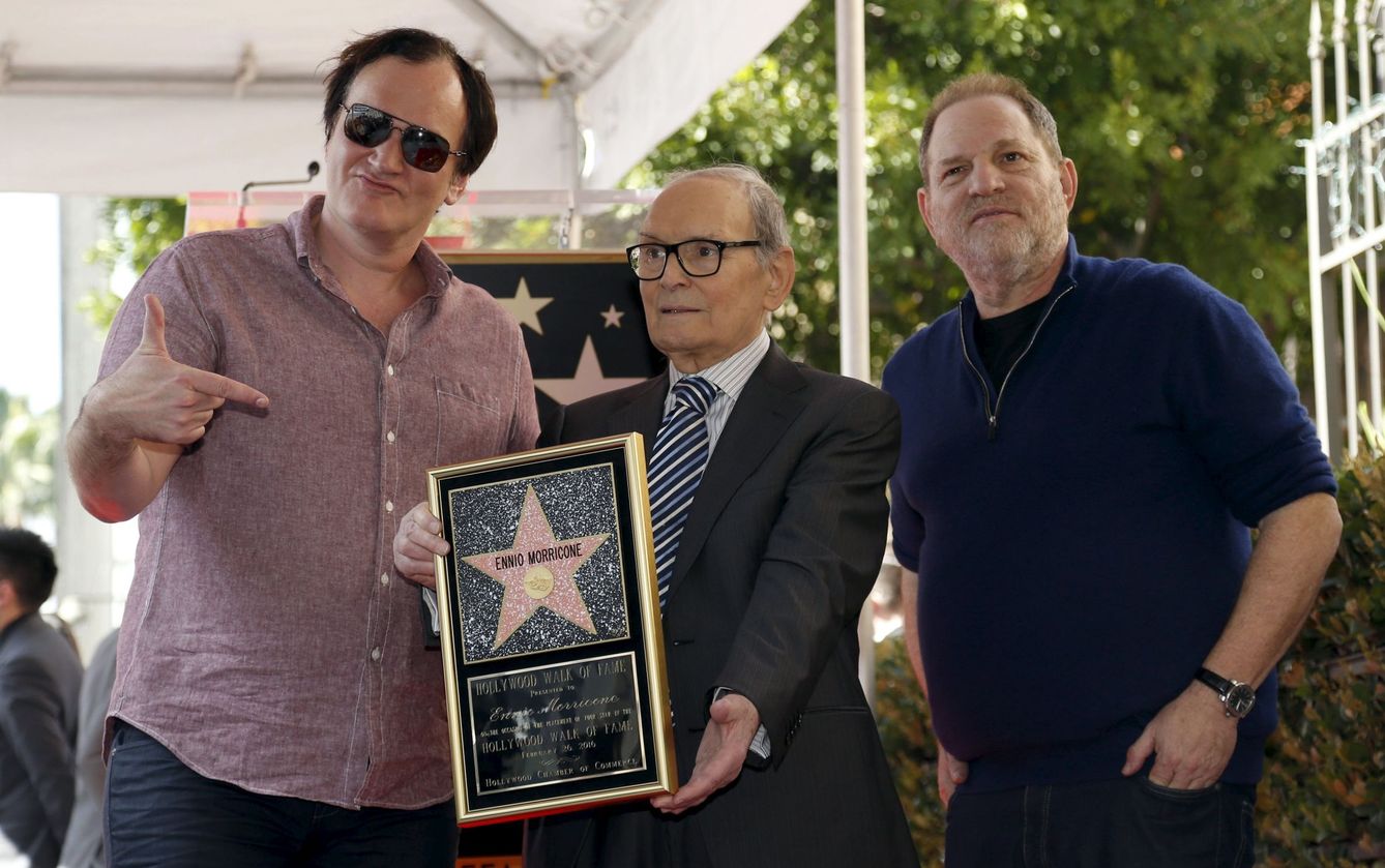 Quentin Tarantino y Ennio Morricone, junto al productor Harvey Weinstein.