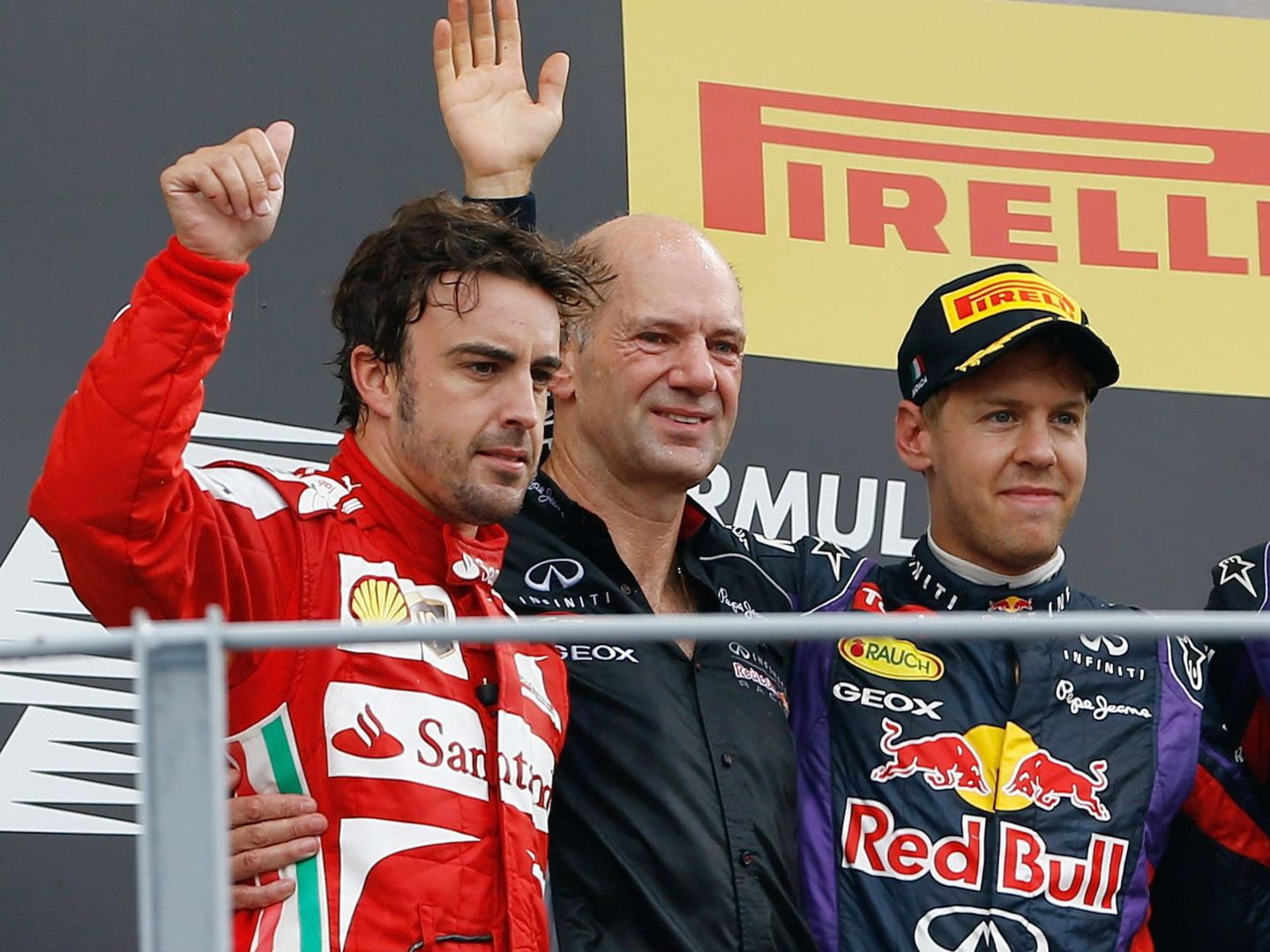 Alonso, Newey y Vettel tras el GP de Italia 2013. (EFE/EPA/Valdrin Xhemaj)