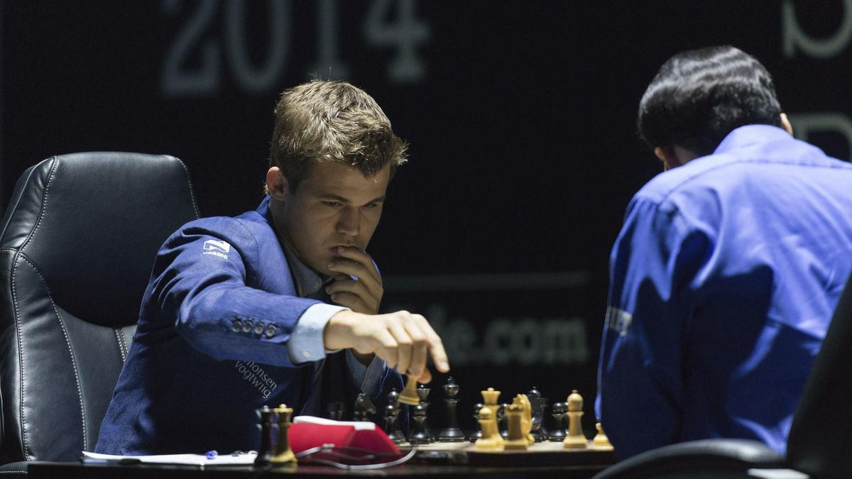 Carlsen gana la undécima partida y retiene el título de campeón del mundo de ajedrez