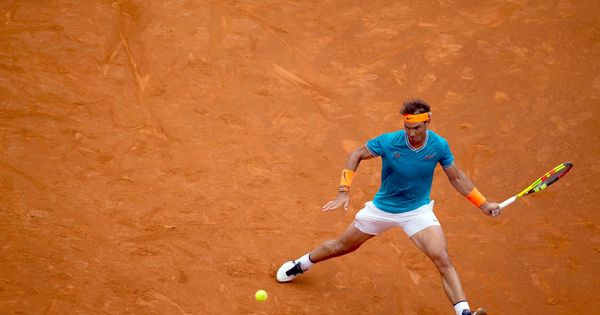 Foto: Rafa Nadal pegando ante David Ferrer. (EFE)