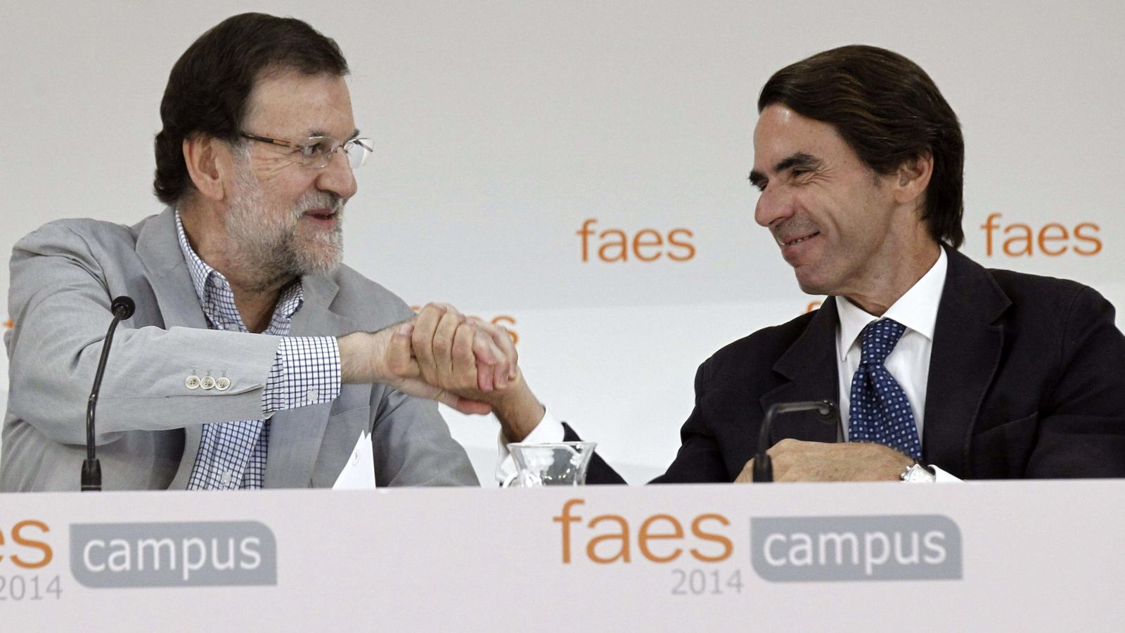 Foto: Mariano Rajoy y José María Aznar, en la clausura del Campus FAES 2014. (EFE)