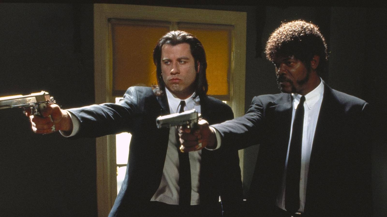 Foto: John Travolta y Samuel L. Jackson en una escena de la película | Miramax