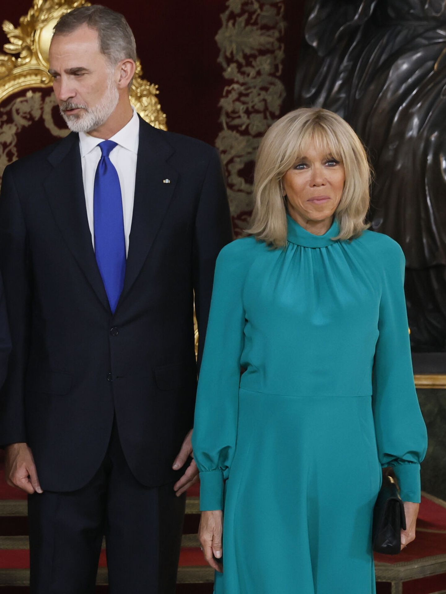 Brigitte Macron, estupenda de azul turquesa. (EFE/Pool/Juanjo Martín) 