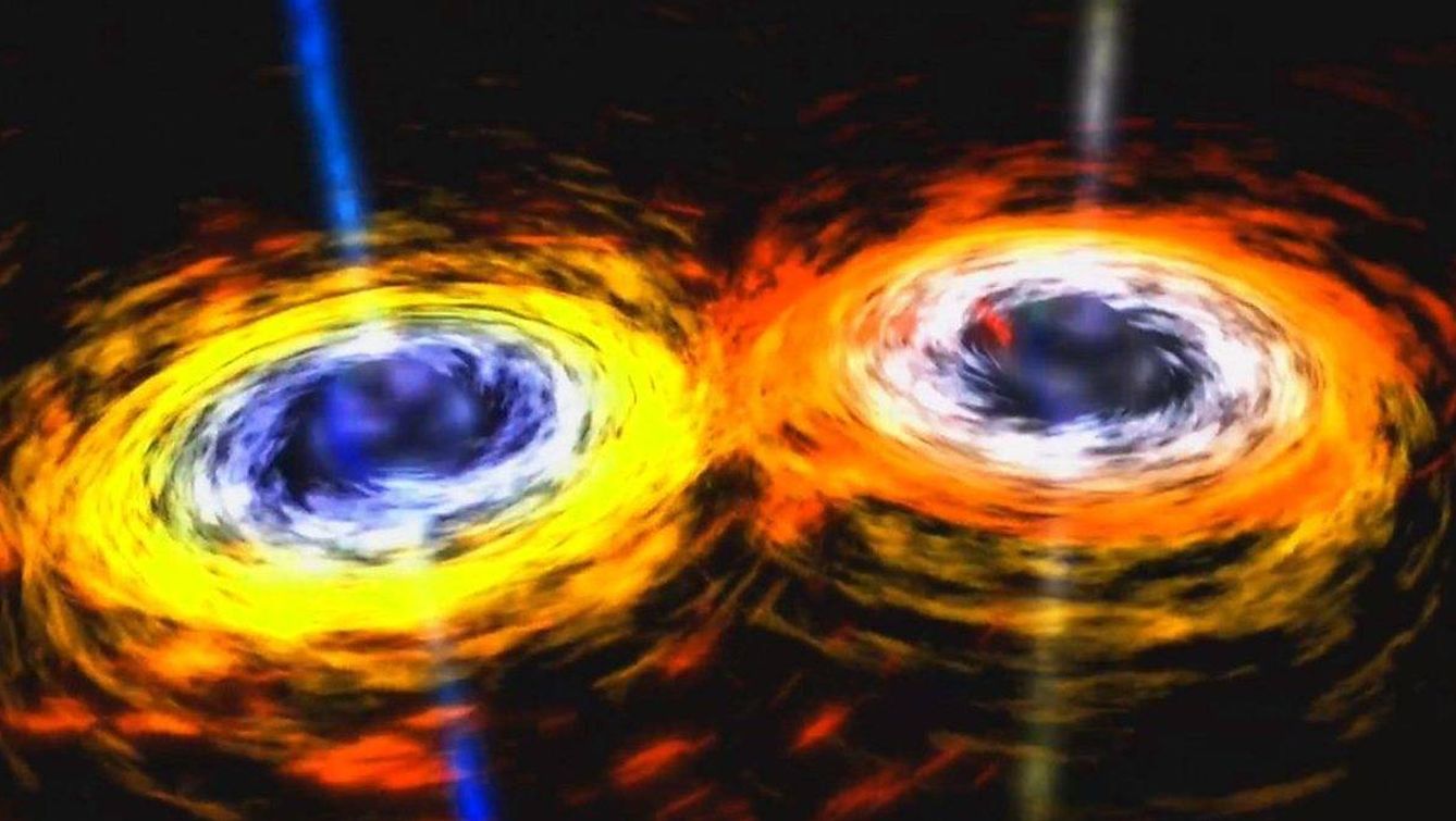 Ilustración de la colisión de dos agujeros negros (NASA).