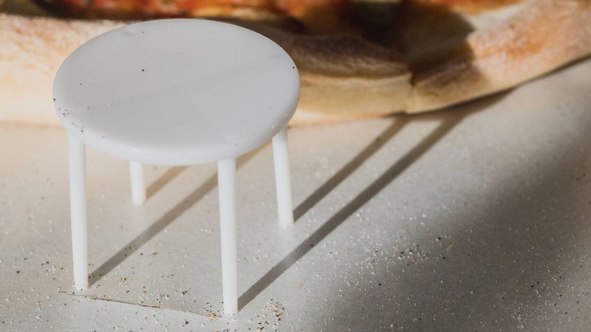 Para qué sirven las 'mesitas' redondas que vienen con las pizzas a domicilio