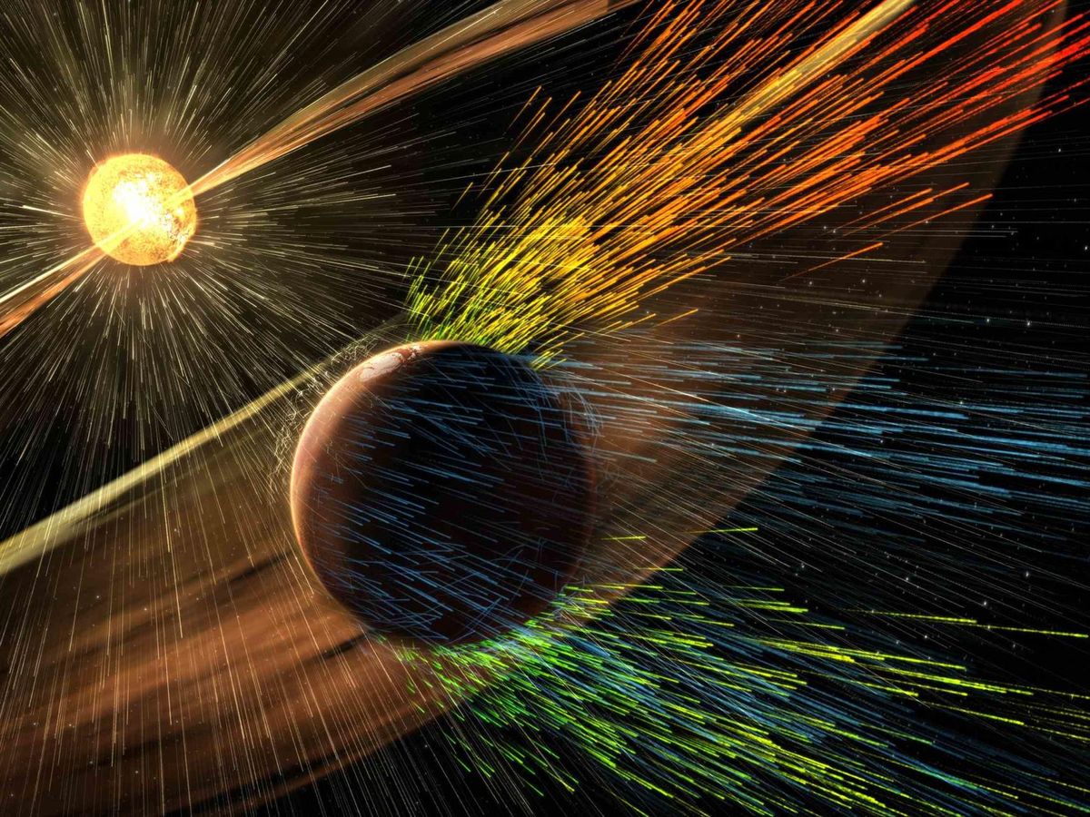 Foto: Recreación artística del viento solar impactando contra la atmósfera de Marte (Reuters/NASA/Goddard Space Flight Center)