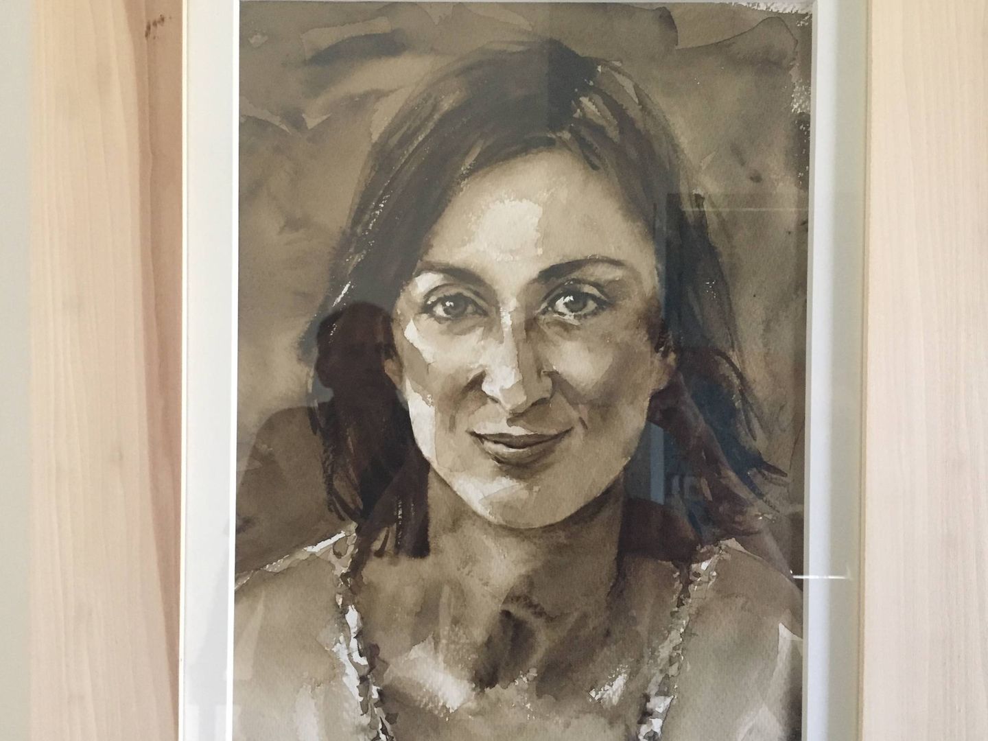 Imagen de un retrato de Daphne Caruana Galizia colgado en su casa de Malta.(Corinne Vella)
