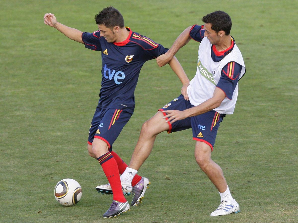 Foto: David Villa y Álvaro Arbeloa durante su etapa en la Selección. (EFE)