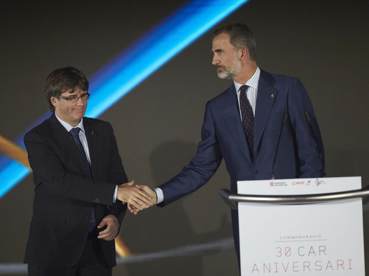 El Rey y Puigdemont en un acto oficial. (EFE)