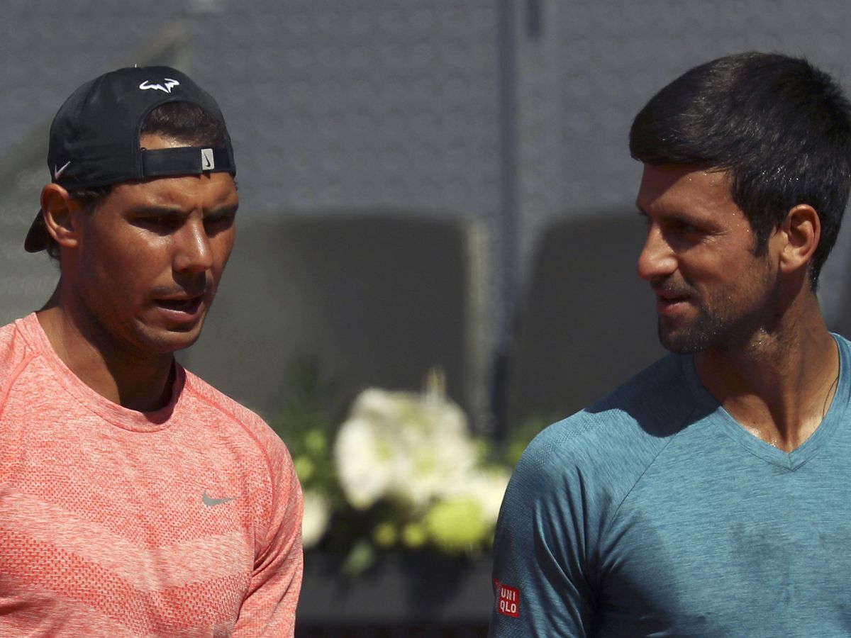 Foto: Rafa Nadal y Novak Djokovic, durante un entrenamiento. (EFE / Sergio Barrenechea)