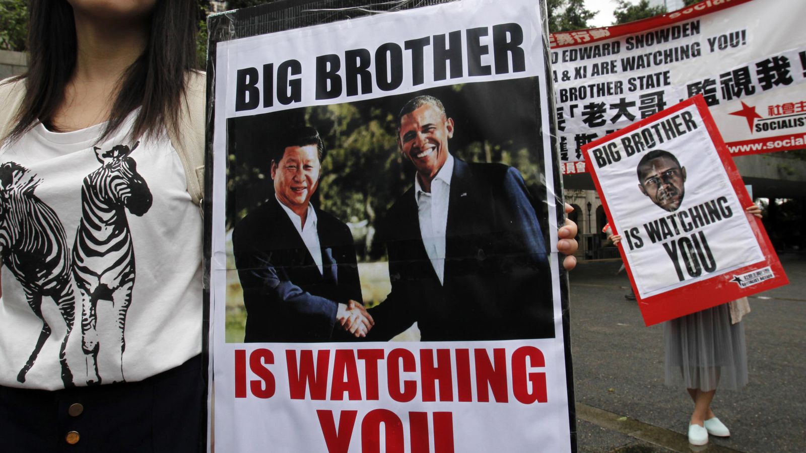 Foto: Manifestantes protestan en apoyo a Snowden con imágenes de Obama y el presidente chino Xi Jinping, en Hong Kong (Reuters).