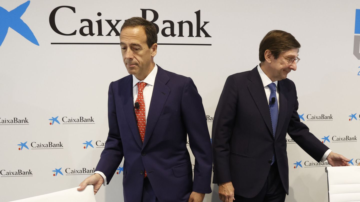 El presidente de CaixaBank, José Ignacio Goirigolzarri (d), junto al CEO, Gonzalo Gortázar. (EFE/Juan Carlos Hidalgo)