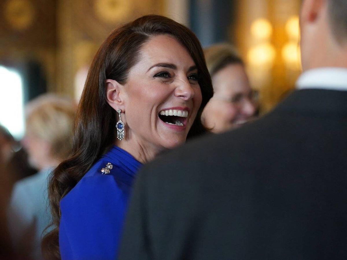 Foto: Kate Middleton, risueña durante la recepción. (Cordon Press)