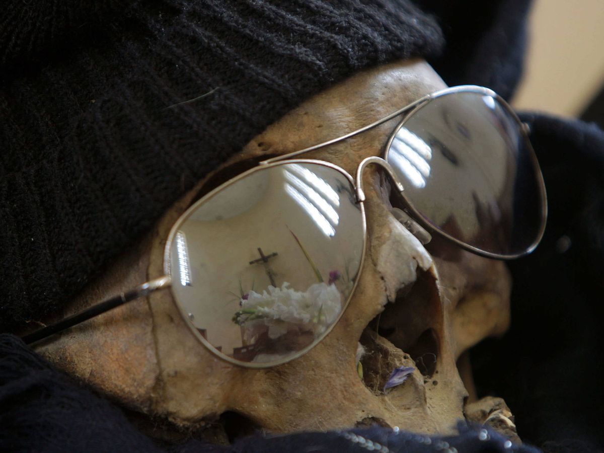 Foto: Los análisis de ADN permitieron encontrar al dueño del cráneo (EFE/Martin Alipaz) 