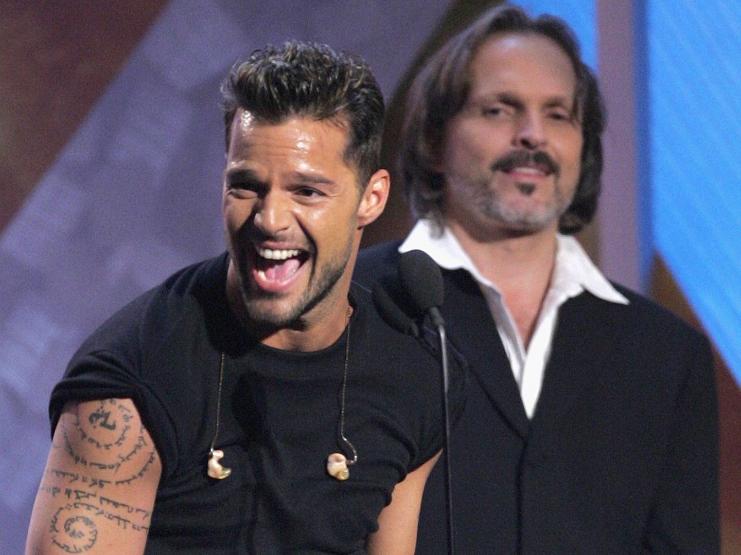 Junto a Ricky Martin, al que le une una gran amistad, en los Grammy Latinos de hace unos cuantos años. (Getty)