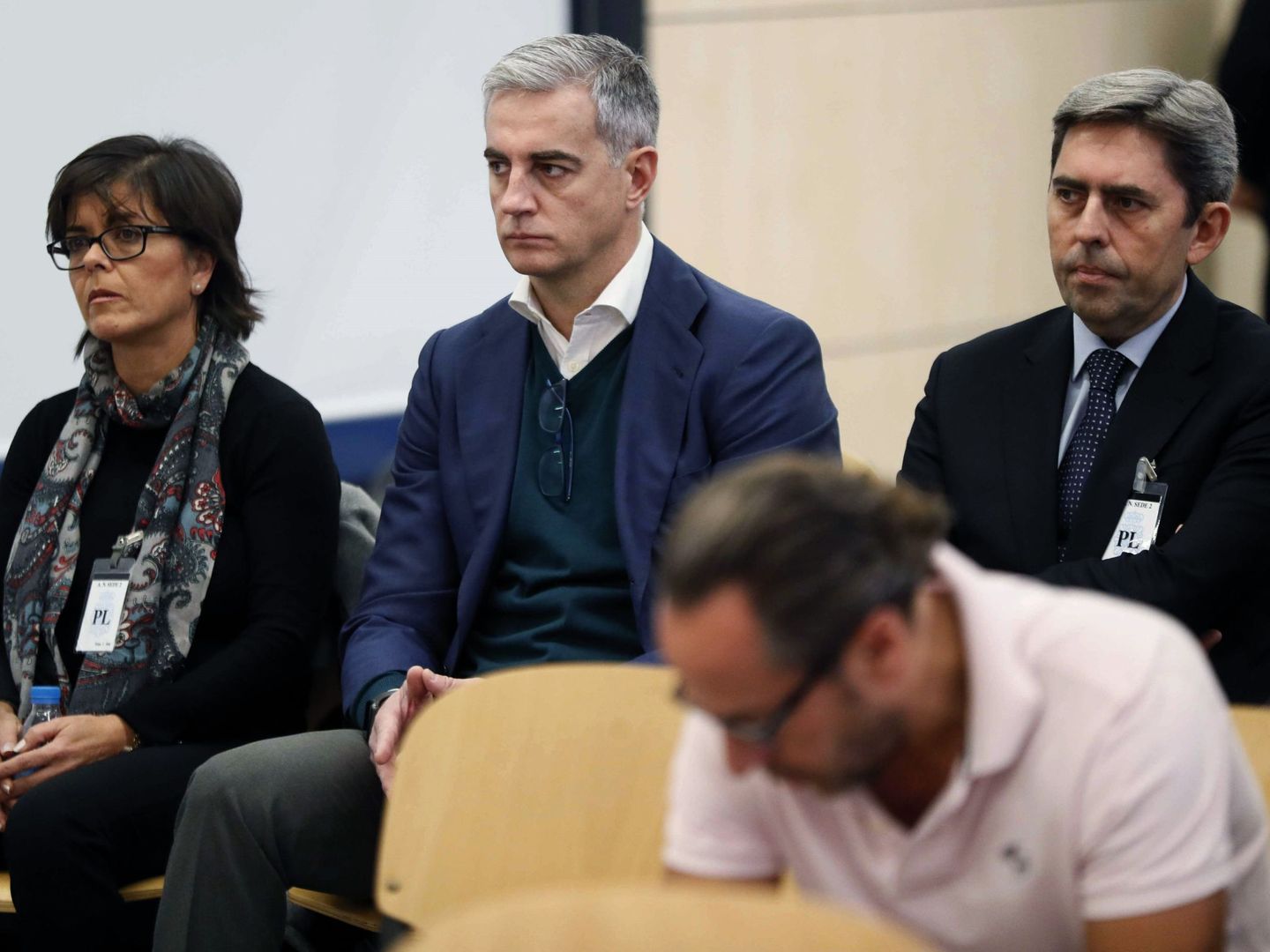 Ricardo Costa, junto a Vicente Rambla. Delante, Álvaro Pérez, en el jucio por la financiación ilegal del PP valenciano. (EFE)