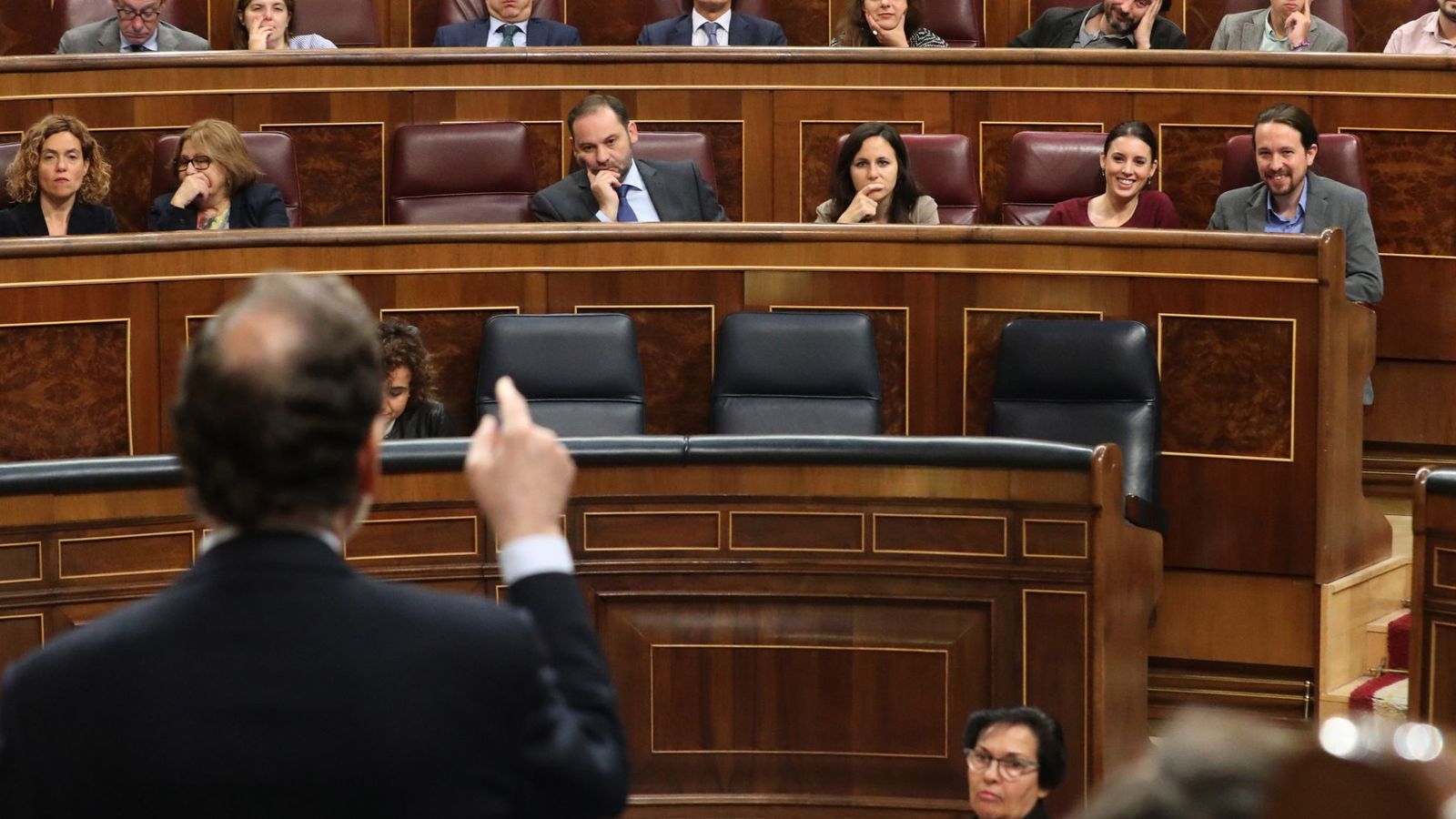 Foto: El presidente del Gobierno, Mariano Rajoy, durante su intervención hoy en el Congreso frente a Pablo Iglesias. (EFE)