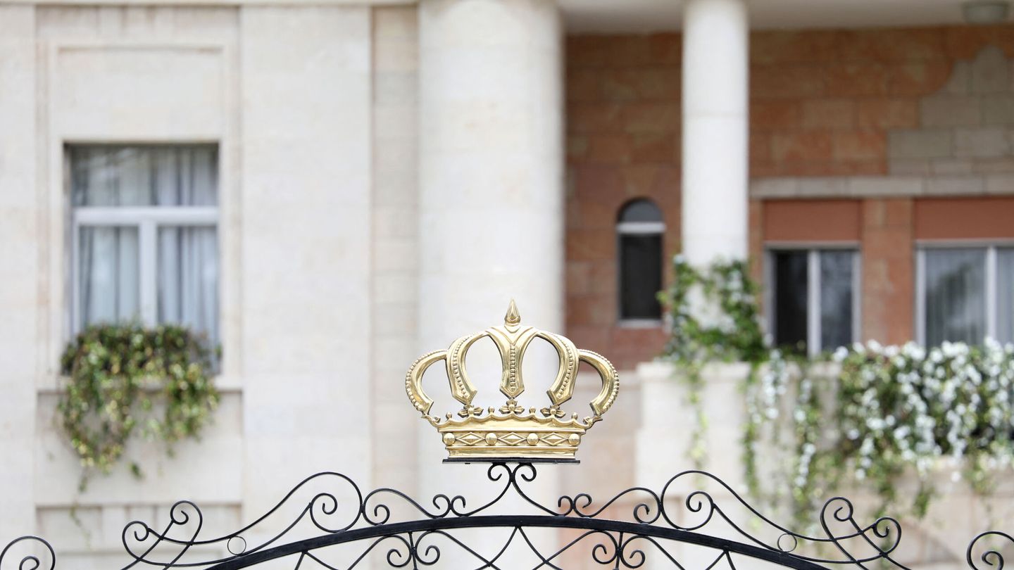 A crown placed above the Zahran Palace gate is pictured on the day of the royal wedding of Jordan's Crown Prince Hussein and Rajwa Al Saif, in Amman, Jordan, June 1, 2023. REUTERS Alaa Al Sukhni