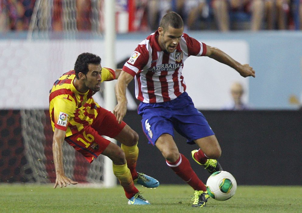 Foto: Mario Suárez, junto a Busquets durante un partido de la pasada temporada (EFE)