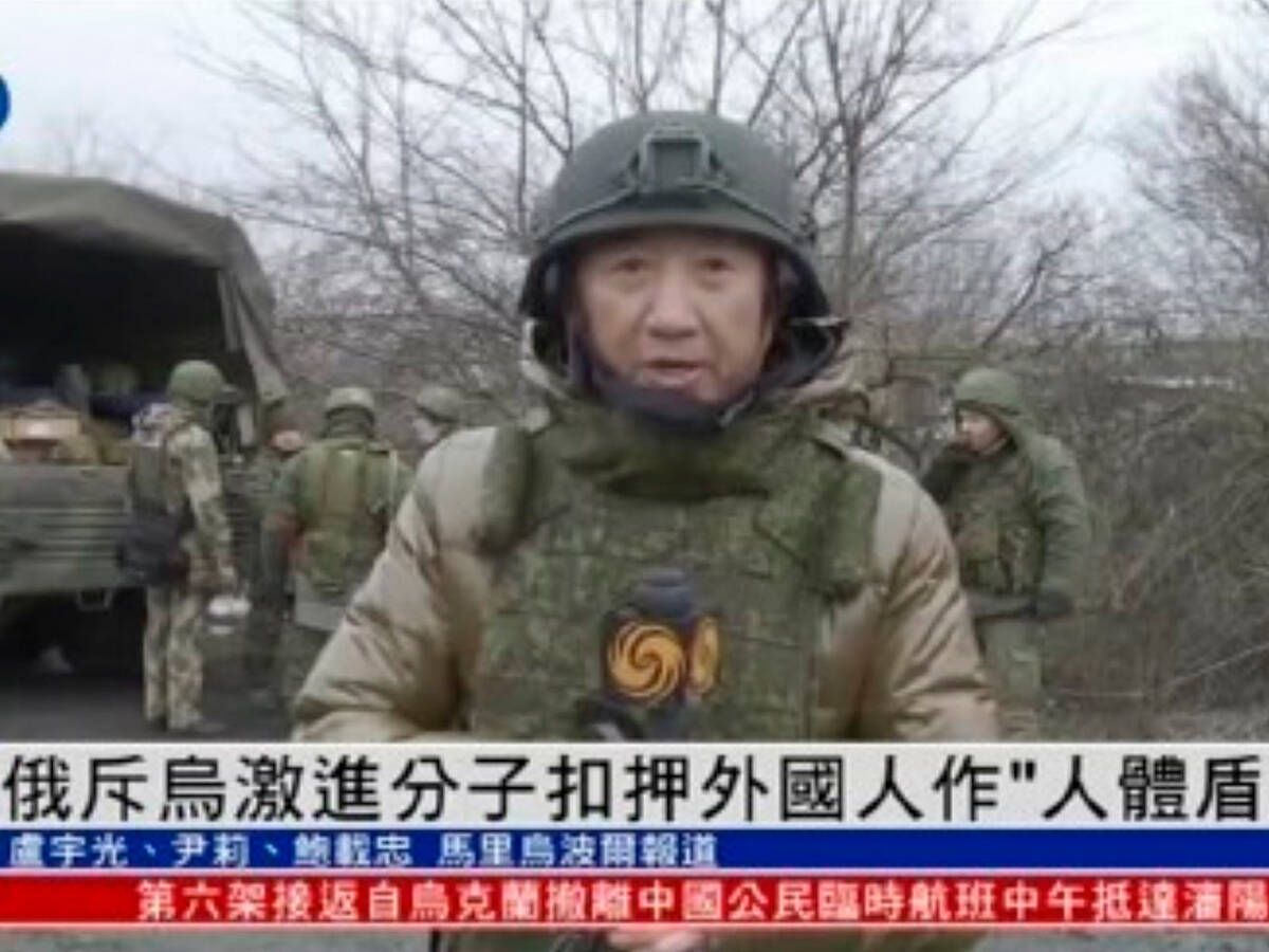 Foto: Una captura de imagen del vídeo de Lu Yuguang reportando para Phoenix TV.
