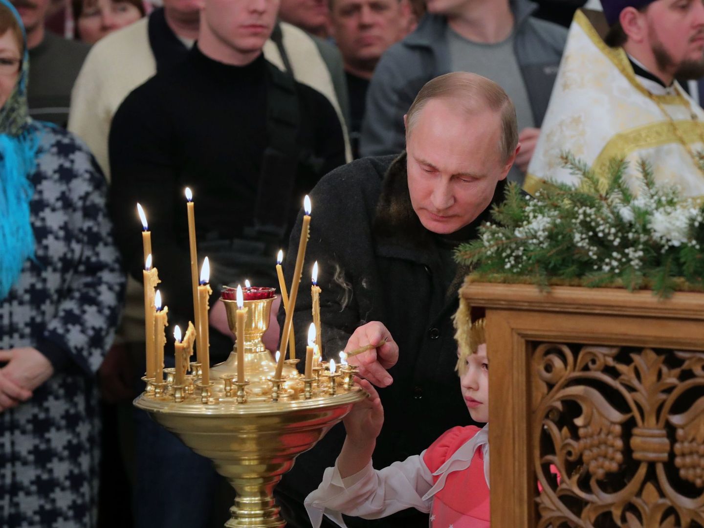 El presidente ruso, Vladimir Putin, durante una celebración de la Iglesia ortodoxa. (Foto: Mikhael Klimentyev)