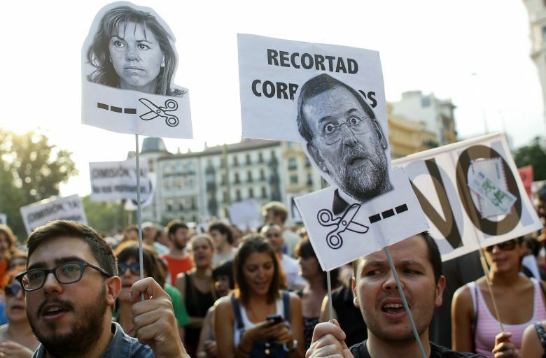 Protesta delante de la sede del PP en Génova, Madrid. (Reuters)