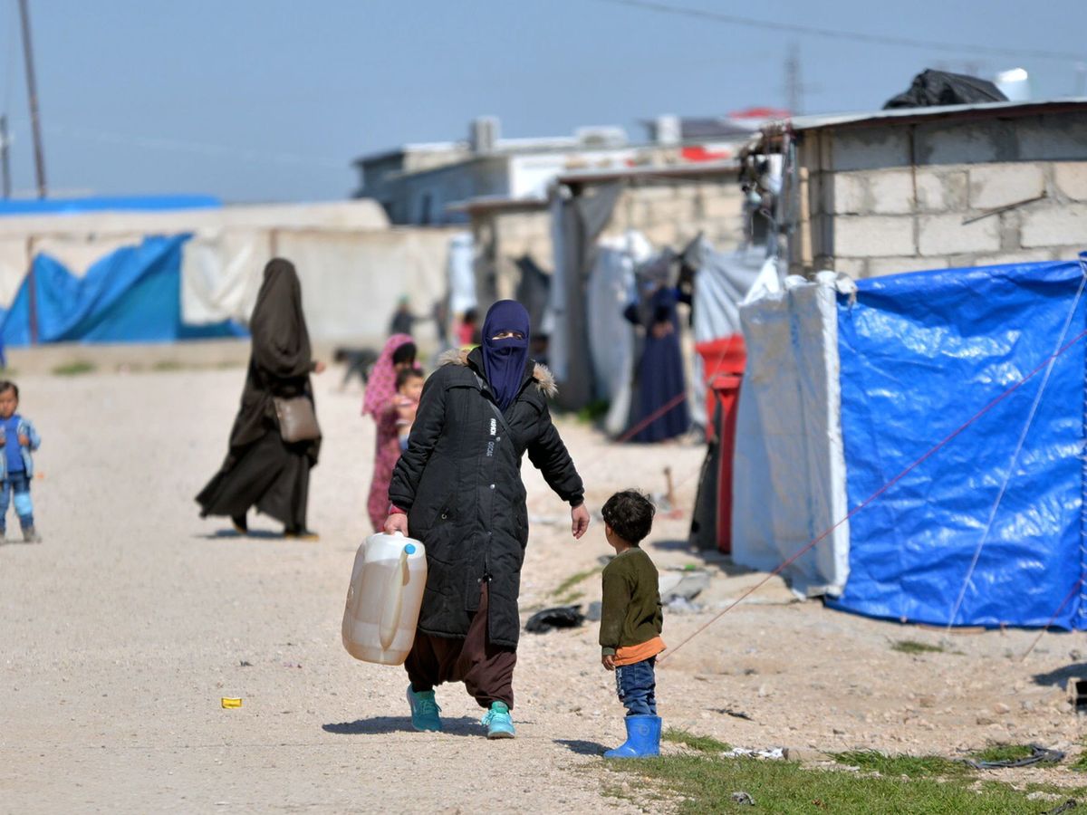 Foto: Una mujer en el campo sirio de Al Roj, donde fue repatriada. (Reuters)