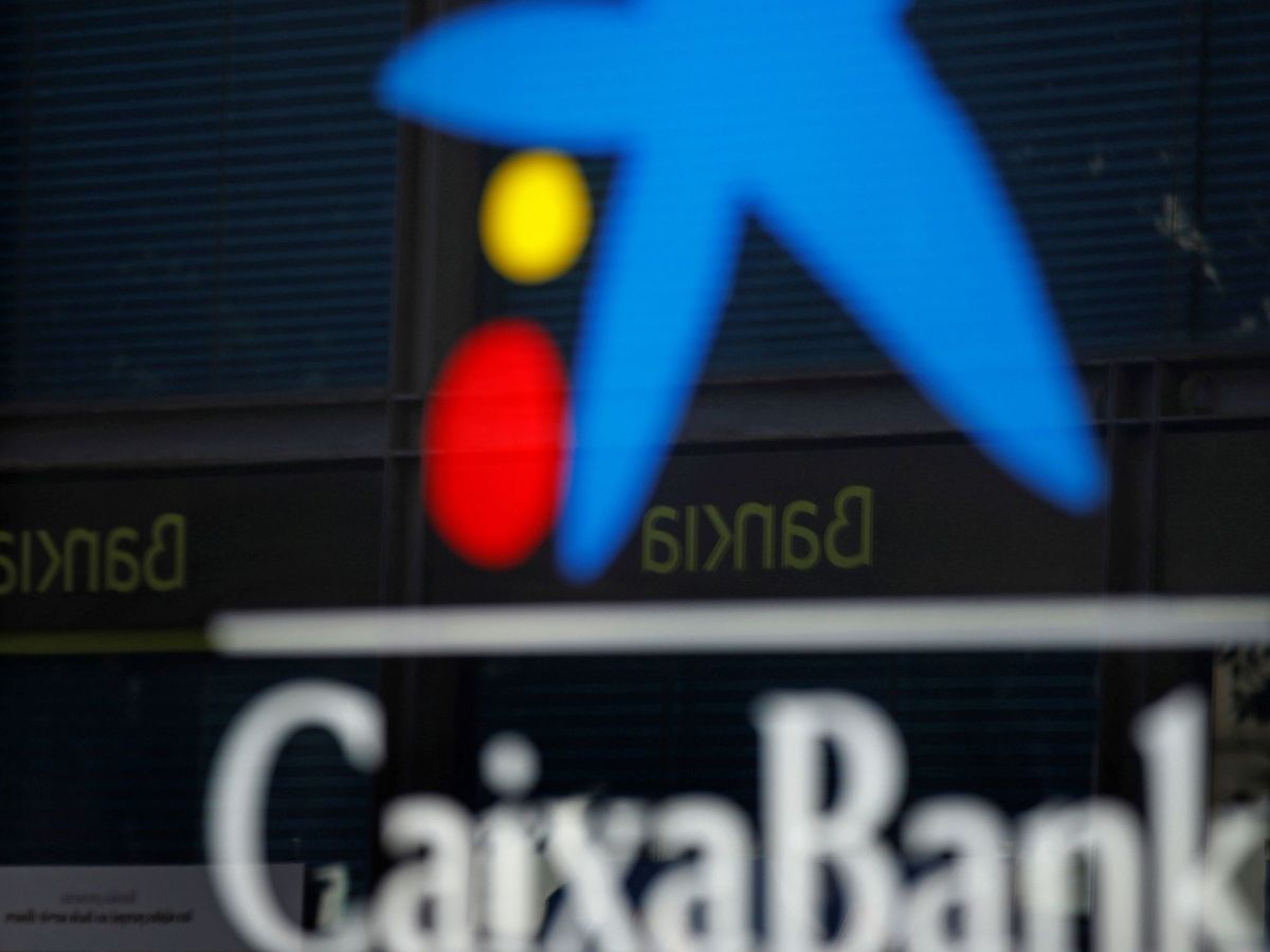 Foto: Los equipos de CaixaBank y Bankia trabajan contrarreloj para anunciar fusión. (EFE)