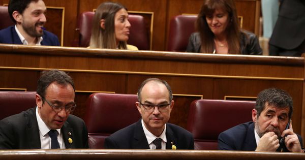 Foto: Josep Rull, Jordi Turull y Jordi Sànchez este martes en el Congreso de los Diputados. (Reuters)