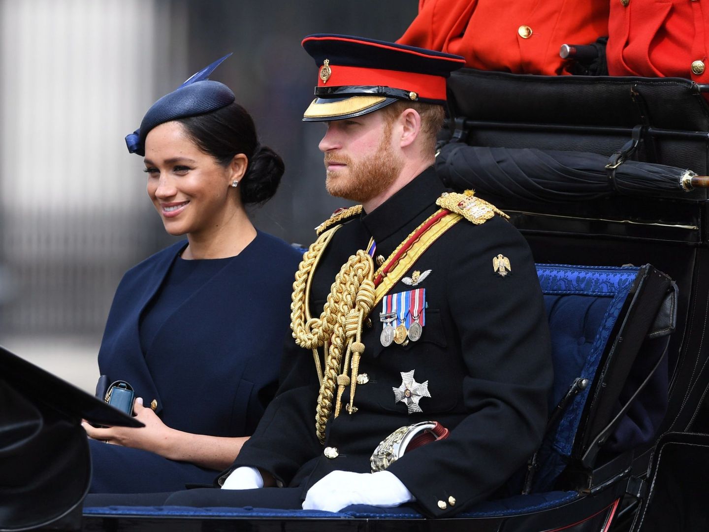NGH02. London (United Kingdom), 08 06 2019.- (R-L) Britain's Harry and Meghan, Duke and Duchess of Sussex ride in a carriage during the Trooping of the Colour Queen's birthday parade, in central London, Britain, 08 June 2019. The annual official Quee