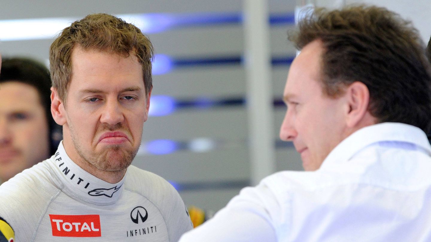 Sebastian Vettel charlando con Christian Horner.