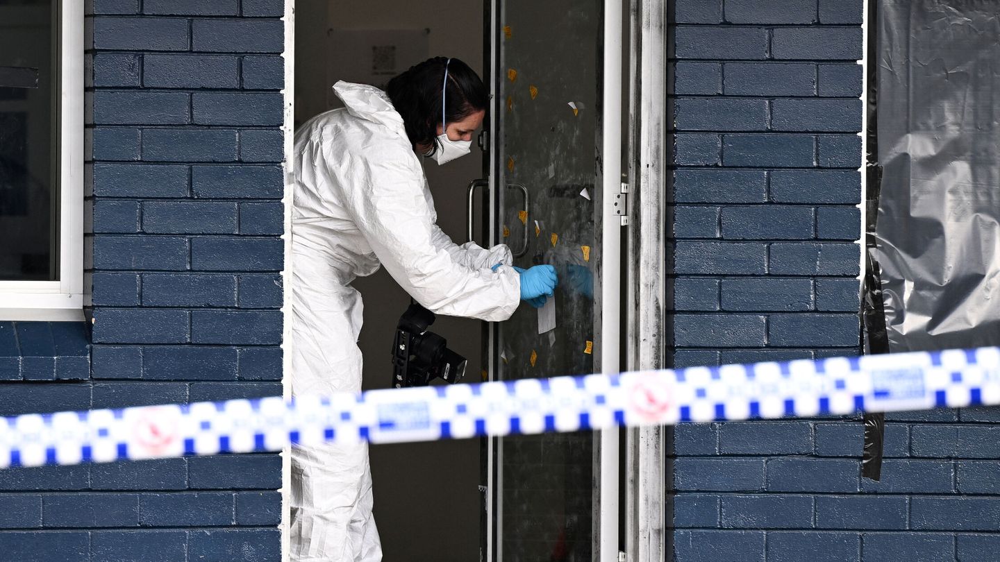 NSW Police and forensics officers work at a crime scene in North Parramatta, in Sydney, Wednesday, February 21, 2024. A young child and a woman in her 40s have been found dead at a martial arts centre hours after police found a man dead in a home a few kilometres away in Sydney. AAP Image Dan Himbrechts via REUTERS  ATTENTION EDITORS - THIS IMAGE WAS PROVIDED BY A THIRD PARTY. NO RESALES. NO ARCHIVE. NEW ZEALAND OUT. NO COMMERCIAL OR EDITORIAL SALES IN NEW ZEALAND. AUSTRALIA OUT. NO COMMERCIAL OR EDITORIAL SALES IN AUSTRALIA