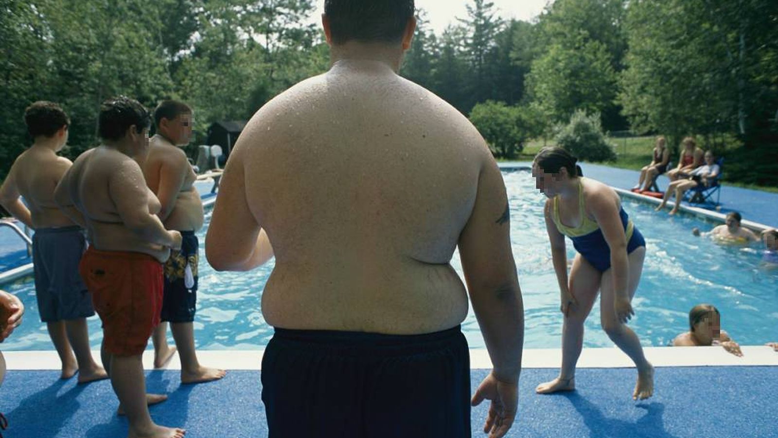 Foto: Gente obesa en la piscina. (Corbis)