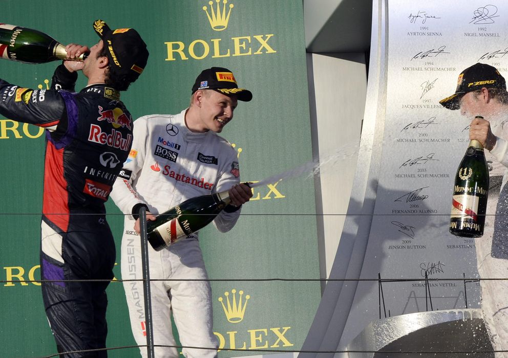 Foto: Ricciardo (i) y Magnussen (c) en el podio junto a Rosberg.