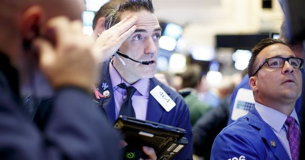 Foto: Corredores de bolsa trabajan en Wall Street, en Nueva York. (EFE)