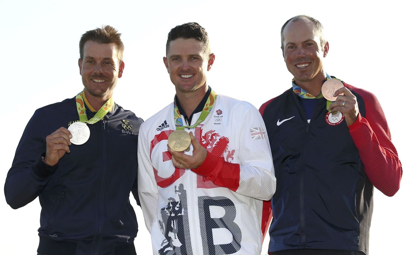 De izquierda a derecha, el podio olímpico de golf: el sueco Henrik Stenson, el británico Justin Rose y el estadounidense Matt Kuchar (Andrew Boyers/Reuters)