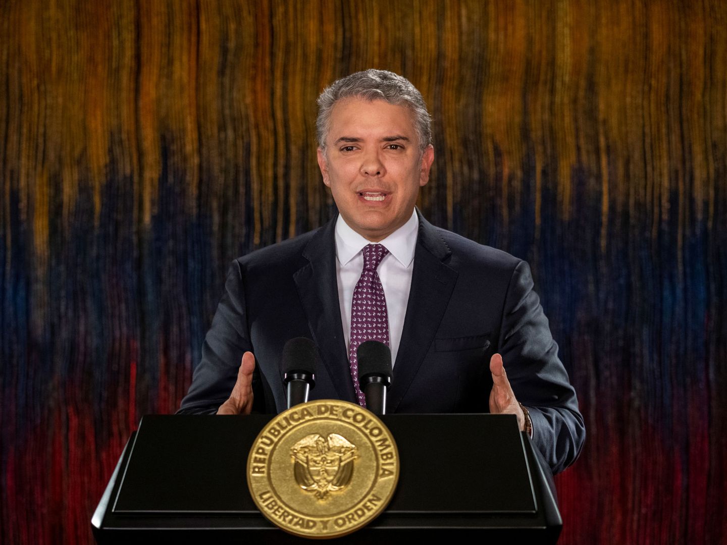 Colombia's President Ivan Duque addresses the nation in a televised speech, in Bogota, Colombia November 22, 2019. Picture taken November 22, 2019. Nicolas Galeano Colombian Presidency Handout via REUTERS ATTENTION EDITORS - THIS IMAGE WAS PROVIDED BY A THIRD PARTY