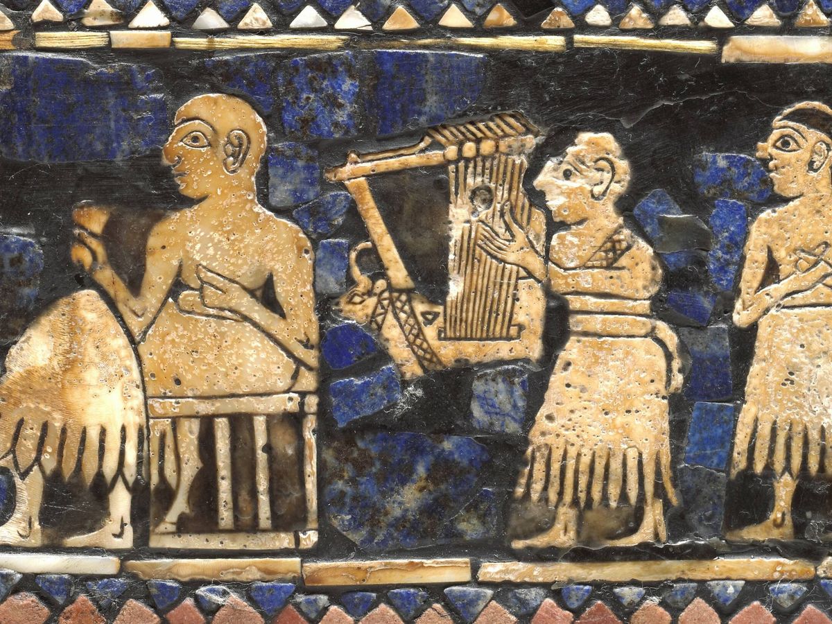 Foto: Representación cerámica de un cantante y un músico de lira entreteniendo a los invitados en un banquete en torno al 2500 a.n.e. (Wikipedia)