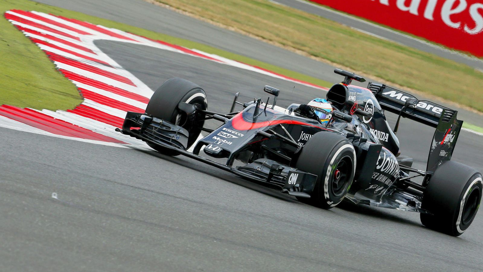 Foto: Fernando Alonso rodando con el McLaren-Honda en el Gran Premio de Gran Bretaña (Efe)