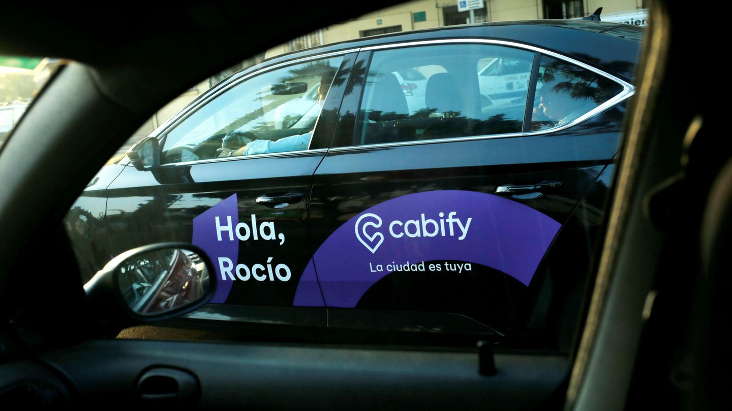 A Cabify taxi car is seen through the window of a car in Malaga, southern Spain August 3, 2018. REUTERS Jon Nazca