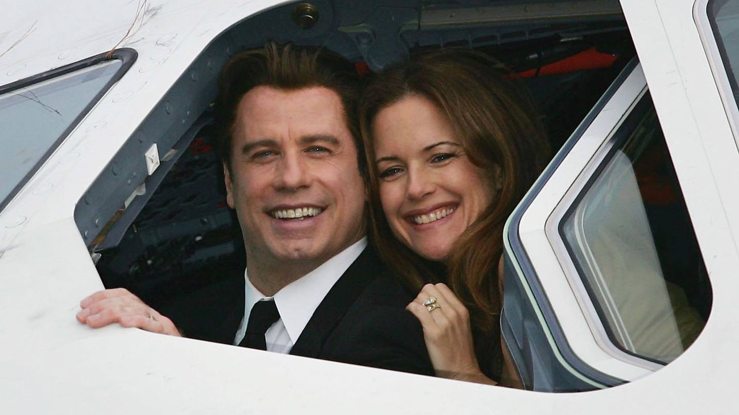  John y Kelly posan en la cabina de un avión. (Getty)