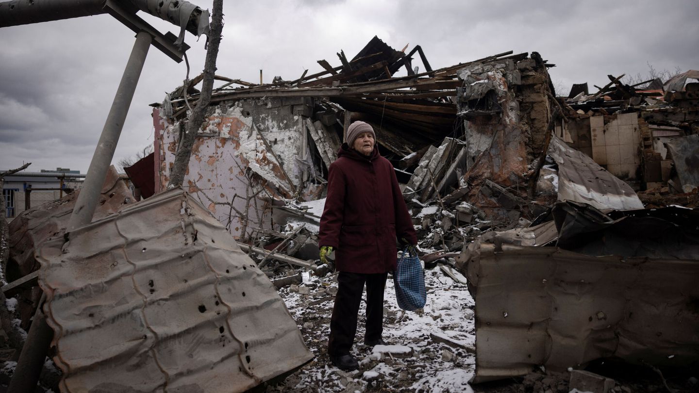 Nadezhda Prokopenko stands in front of the house of a relative that was destroyed in a Russian missile strike, amid Russia’s attack on Ukraine, in Selydove near Avdiivka, Ukraine, February 19, 2024. REUTERS Thomas Peter