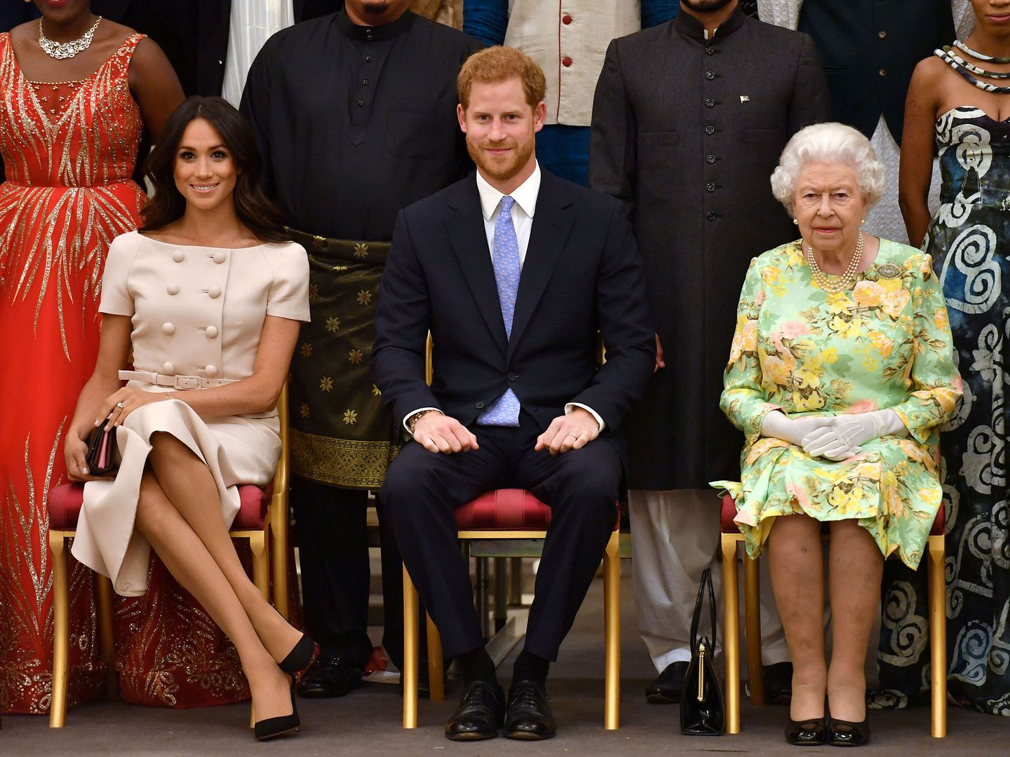 Meghan y Harry junto a la reina Isabel, en una imagen de archivo. (Reuters)