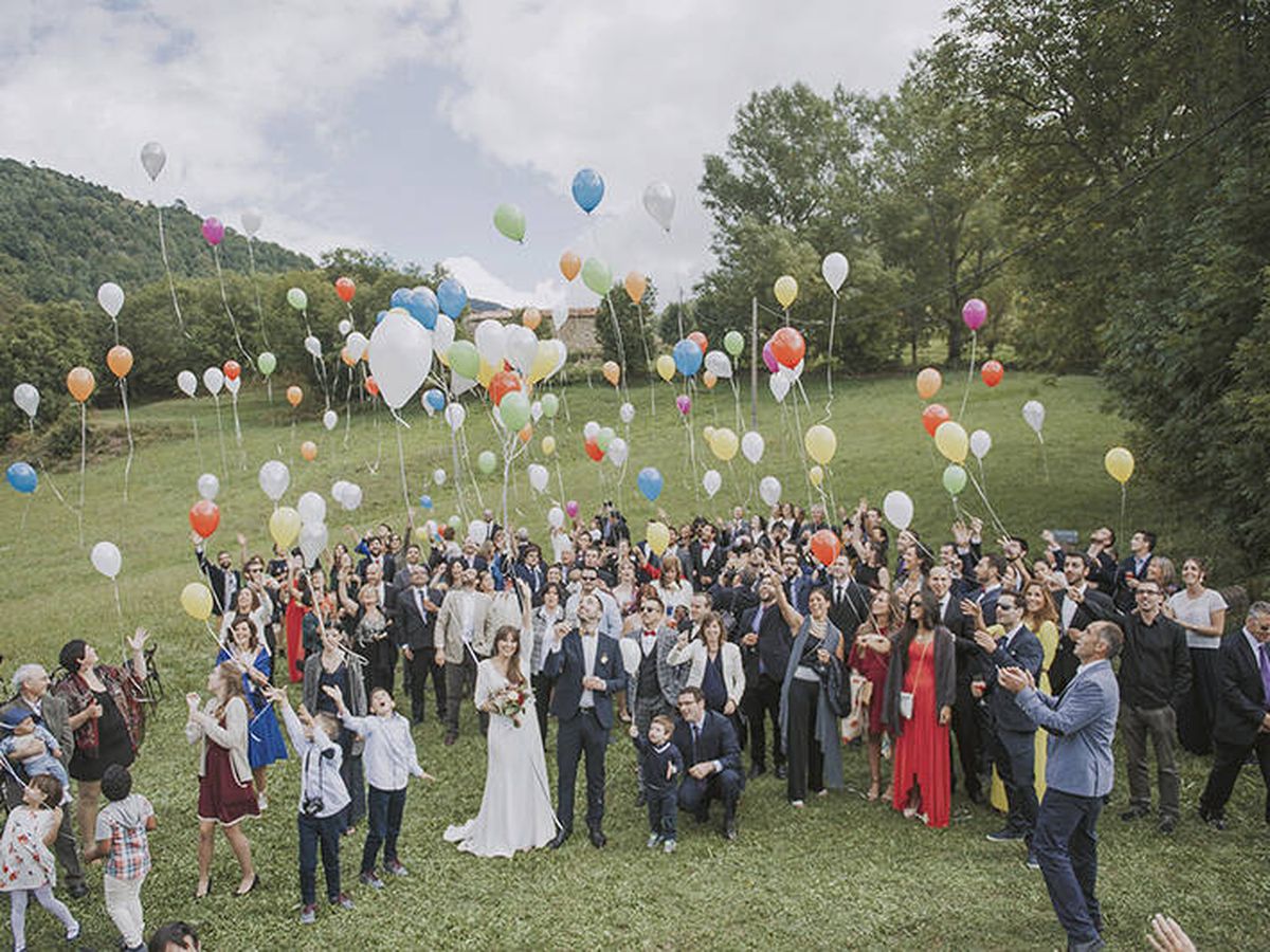 Foto: Suelta de globos en una boda. (Fotografía @SayCute)